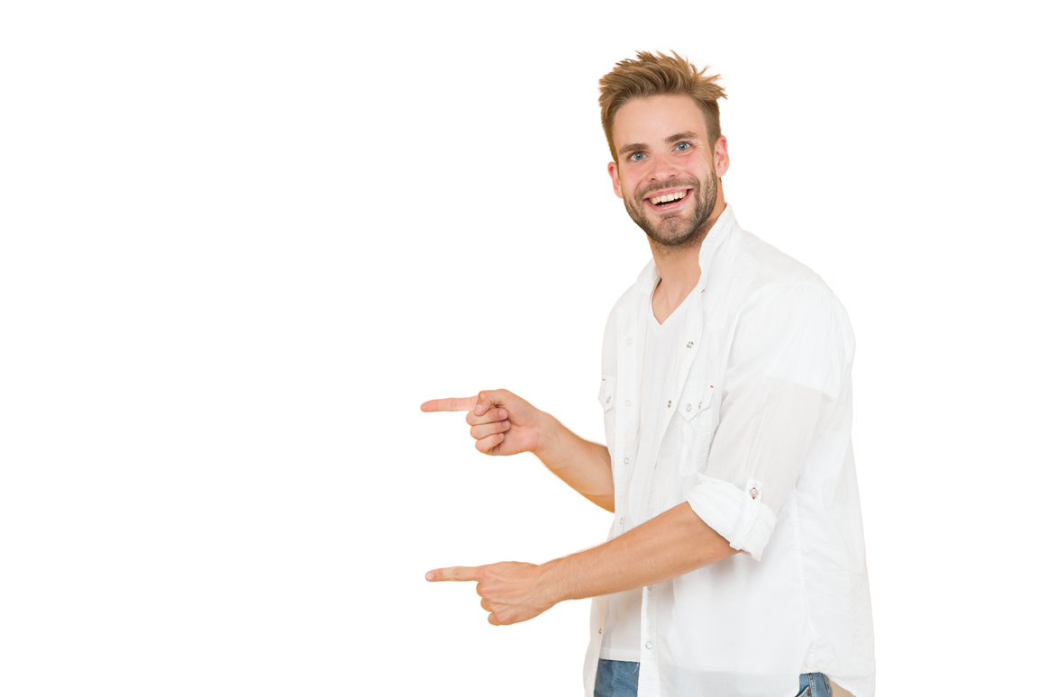 Look there. Man pointing at copy space. Check this out. Man muscular handsome smiling unshaven guy on yellow background pointing finger. Advertising concept. Summer advertising. Advertising agency